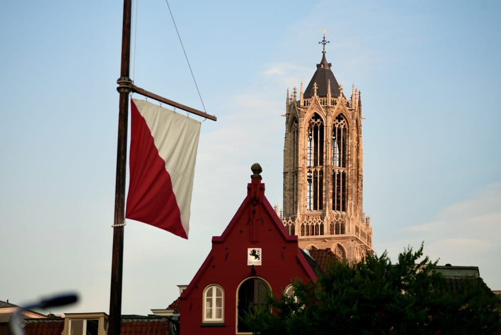 Dom Tower with a red and white flag typical for Utrecht